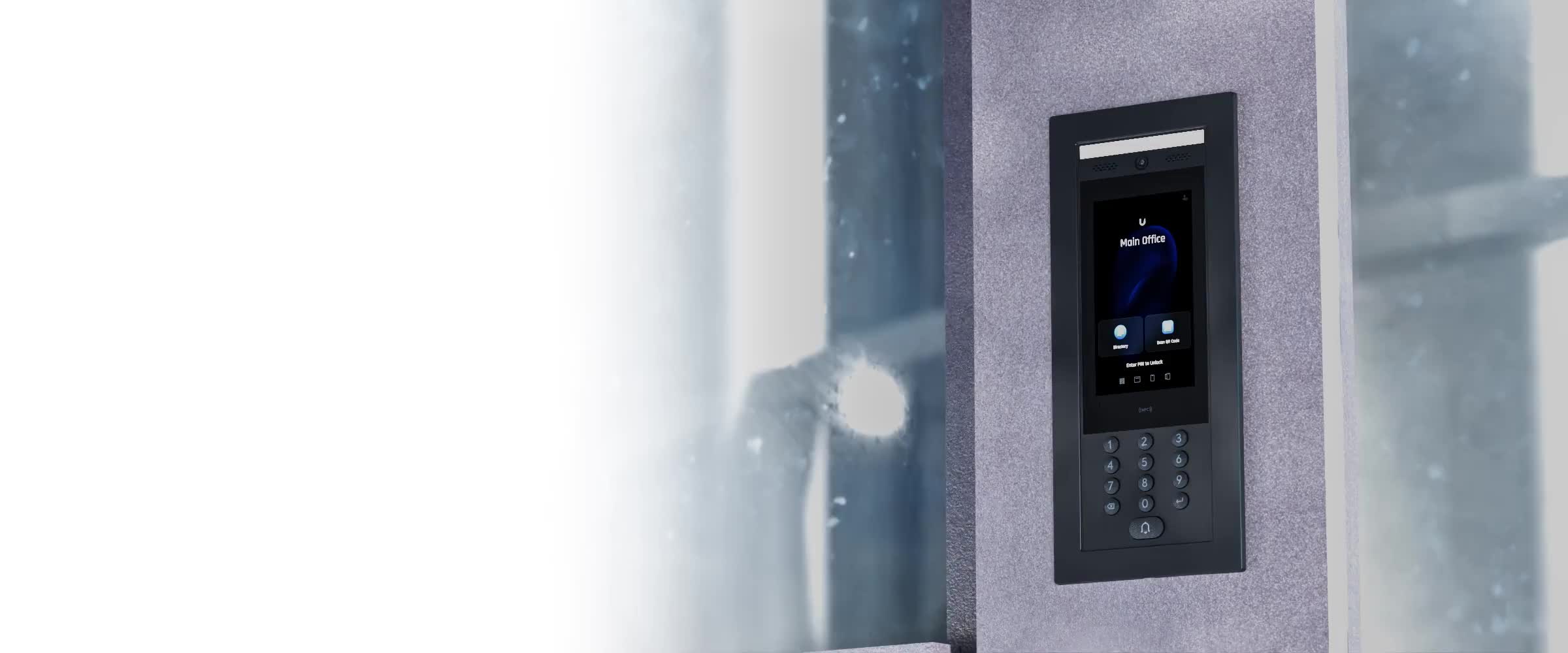 UniFi G4 Doorbell Pro video intercom flush-mounted in a commercial building exterior wall — touchscreen display showing Main Office directory, keypad entry, and two-way video communication, installed by Alpine IT in Colorado Springs, CO