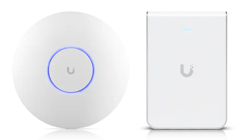 UniFi U7 Pro ceiling-mounted wireless access point and U7 Pro Wall unit — commercial-grade business Wi-Fi hardware designed for high-device-count environments, installed by Alpine IT in Colorado Springs, CO